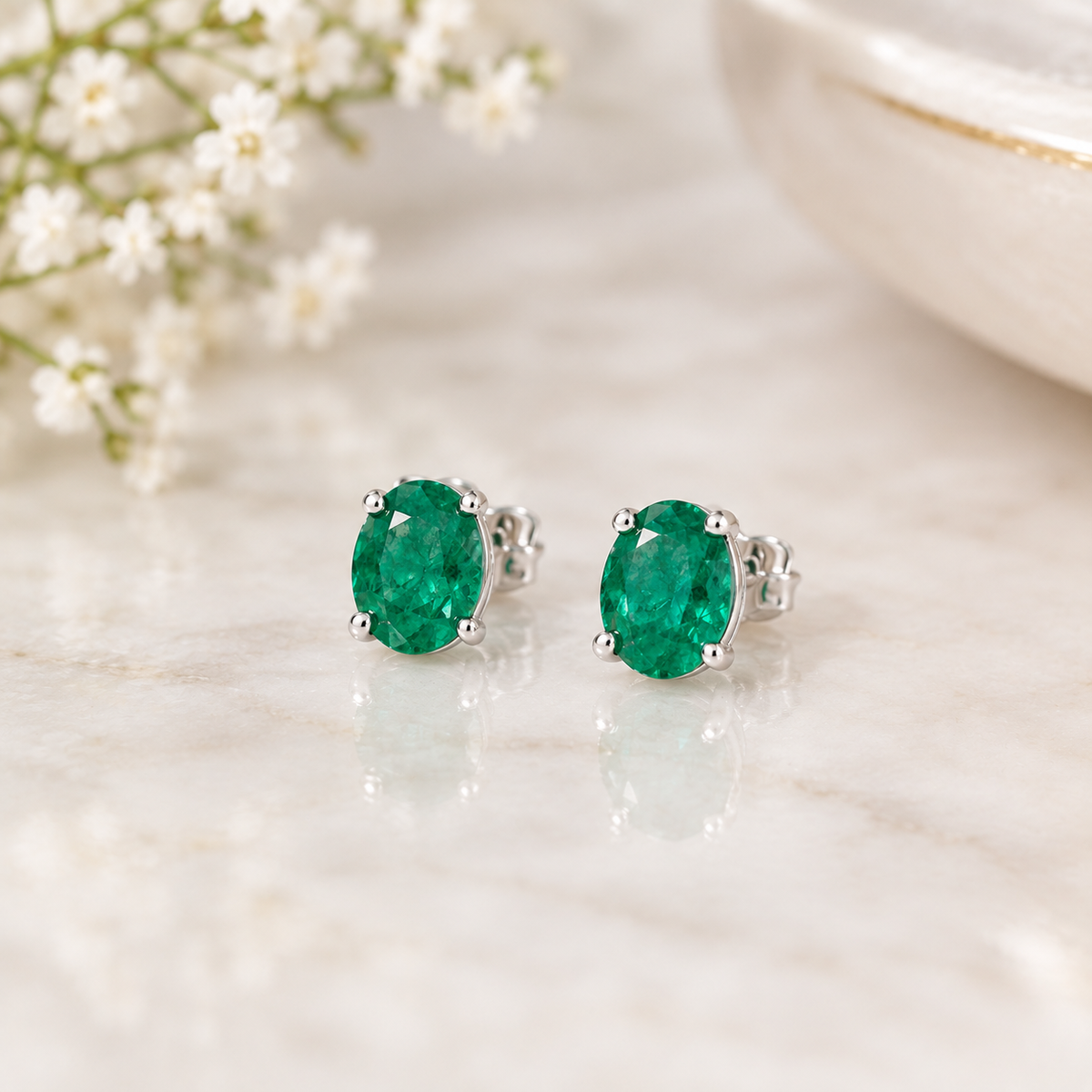The Sterling Solitaire Emerald Stud Earrings