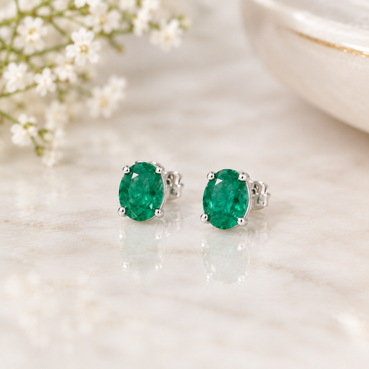 The Sterling Solitaire Emerald Stud Earrings